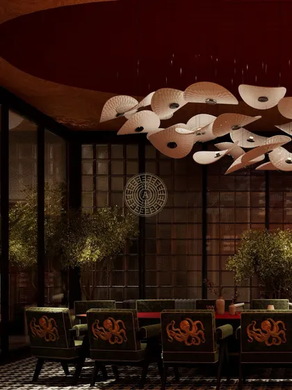 The full view of the private dining table in the Koko suite render, showing how the embroidered chairs and fan-like chandelier create a powerful design statement.