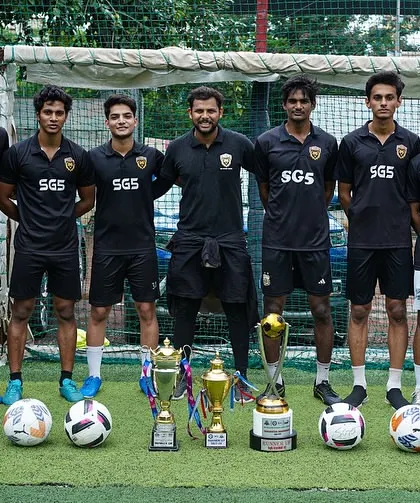 The full coaching team lined up, showcasing the strength and depth of our coaching staff.