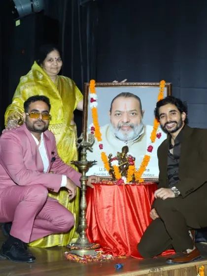 Paying homage to our founder at the beginning of the ceremony. We are deeply rooted in tradition and carry forward a legacy of respect for our gurus.