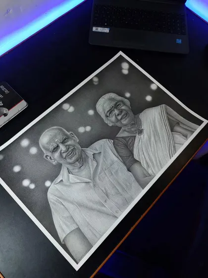 The full A2 drawing for the couple from Kerala, set against a soft bokeh background to make them the center of attention.