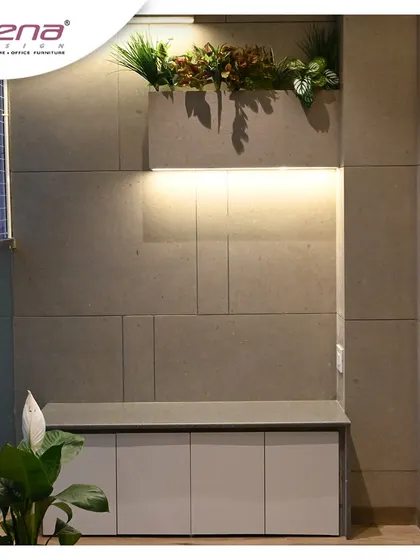 Even small spaces like a balcony can be transformed. Here, we created a simple yet elegant shoe cabinet with a planter box on top, adding greenery and storage.