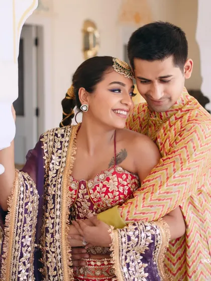 Every kiss tells a story. A beautiful, intimate moment from Mishi and Saurav's Mehendi function in Jaipur.