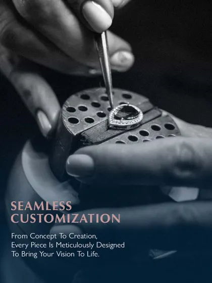 Seamless customization. From concept to creation, every piece is meticulously designed to bring your vision to life. An artisan works on a pear-shaped diamond piece, ensuring every detail is perfect.