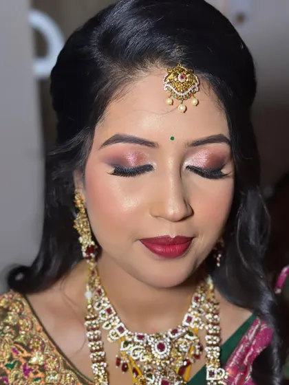 A close-up of the shimmering pink and purple eyeshadow. This kind of look is perfect for an evening reception, as it catches the light beautifully.