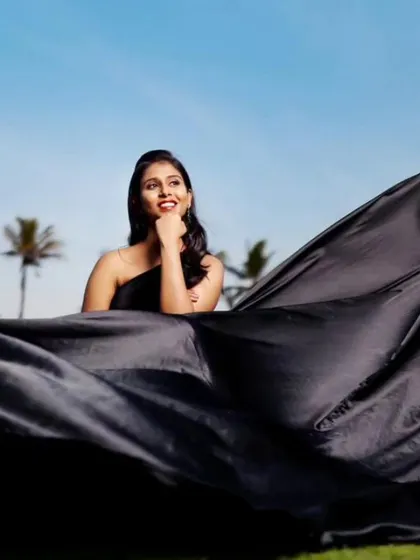 A beautiful shot of the bride-to-be, with the black flying gown creating a stunning visual effect.
