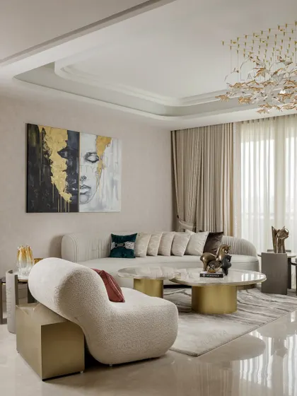 Our signature gold is woven through every detail in this living area. The coffee table base, side tables, and even the artwork feature gold accents that tie the space together and add a touch of Lalittya glamour.