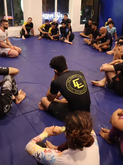 A candid shot of the students during a seminar break. It's not just about the training, but also about the connections you make off the mats.