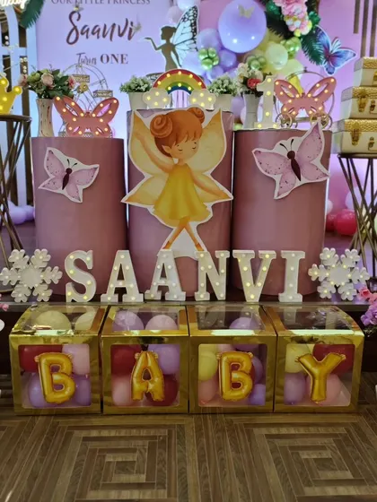 A close-up of the 'BABY' blocks and other decor details.