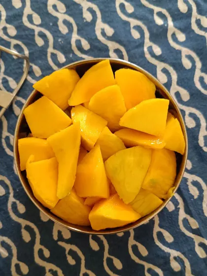 When mangoes are in season, I love to include fresh, ripe mango slices with my meals. It's a simple, natural dessert that everyone enjoys.