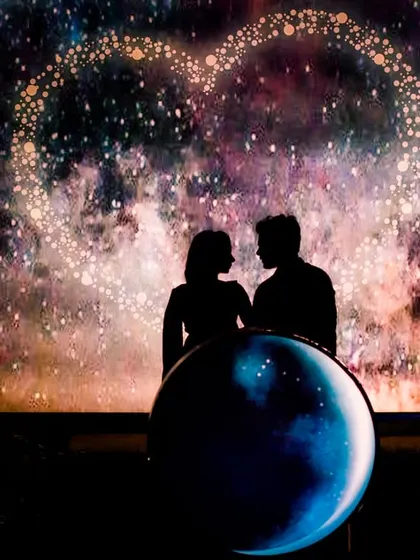 A breathtaking silhouette against a cosmic, heart-shaped nebula. This is a highly creative and artistic shot, perfect for a truly unique pre-wedding photo.