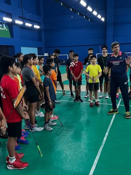 A group of our Pro Batch and High-Performance athletes listen intently as Prakash sir shares valuable tips after a sparring session at our Padukone-Dravid Centre for Sports Excellence (PDCSE).