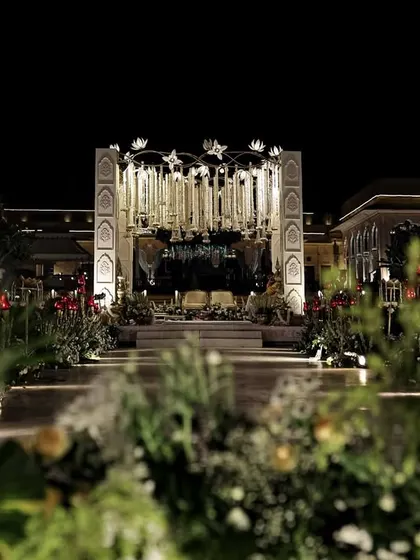 A stunning night view of the mandap, standing as a beacon of light and love against the backdrop of the historic Jaipur palace.