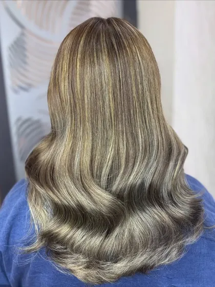 A close-up of the Platinum Ash blonde, showing the cool tones and the healthy condition of the hair.