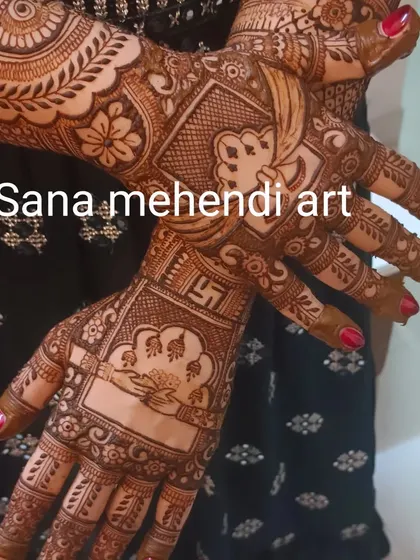 This back-of-hand design features auspicious symbols like the swastika and 'Om' within a detailed pattern. It's a perfect choice for religious festivals and pujas.