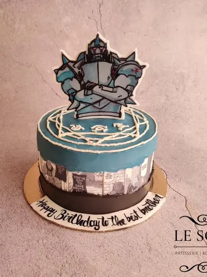 I was introduced to Fullmetal Alchemist through this cake order. This half-kg Chocolate Truffle cake features Alphonse Elric and the transmutation circle, with manga panels decorating the sides.