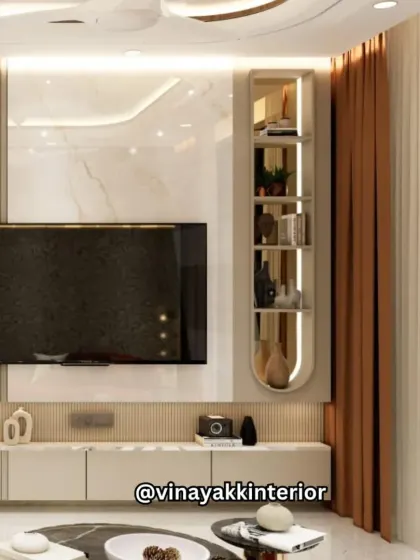 This TV unit is designed to be a focal point. The combination of a marble-finish backdrop, integrated shelving with a curved detail, and warm backlighting creates a look that is both clean and sophisticated.