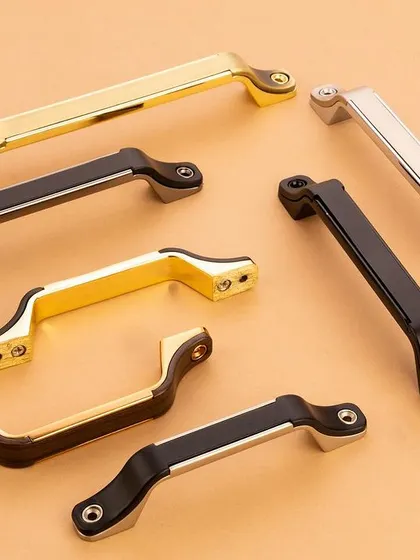 A variety of classic and contemporary cabinet pulls. The arrangement allows clients to easily compare different styles in a single, well-lit image.