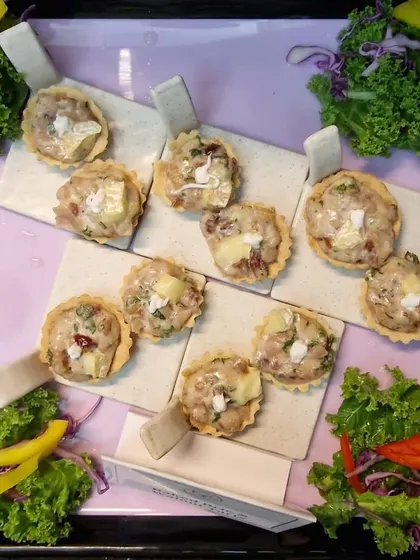 Take a seat, grab a treat! Our baked brie and walnut tarts are the perfect way to welcome guests, offering a warm and savory bite.