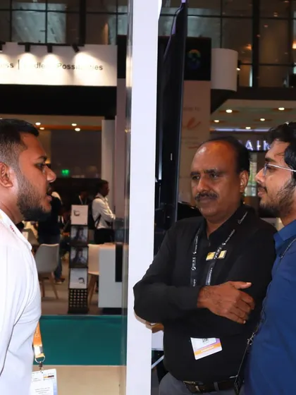 Our technical experts are always on hand to provide in-depth information. Here, a member of our team discusses AV solutions with attendees at the Smart Home Expo, fostering valuable industry connections.