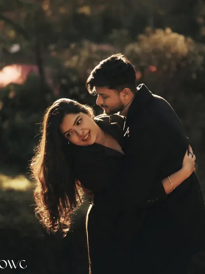 A tender embrace captured during golden hour, this pre-wedding photo is filled with warmth and intimacy.