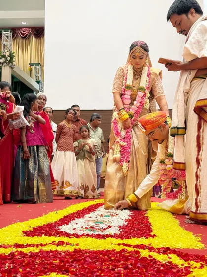 A close-up of the Saptapadi ritual on a floral path. These small, thoughtful details are what make a wedding truly memorable.