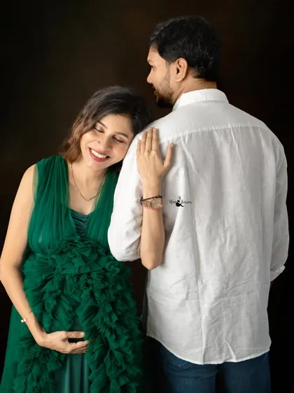 A quiet, happy moment. The way she leans on her partner shows their comfort and connection. These are the real moments I strive to document.