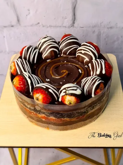 Another view of the Salted Caramel Chocolate Strawberry Bomb Cake. The combination of sweet, salty, and fruity is absolutely irresistible.