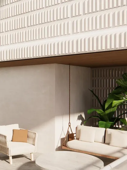The terrace walls feature a textured white tile, adding a subtle pattern that complements the natural elements.
