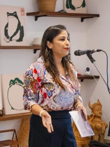A performer sharing her work at our Saturday Open Mic. These weekend sessions are a perfect way to unwind and immerse yourself in creativity.