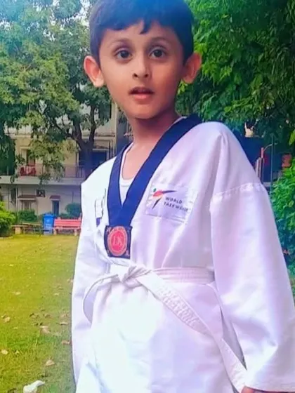 This young student is a future champion. His focus and determination are already visible.