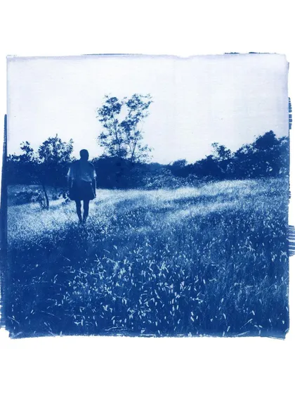 Another version of the figure-in-a-field cyanotype, showing the subtle variations that make each handmade print unique.
