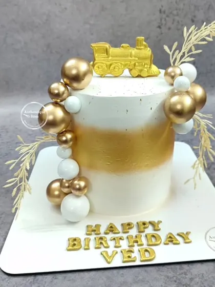 Another view of our elegant train engine cake, a perfect choice for a classy baby shower or birthday.