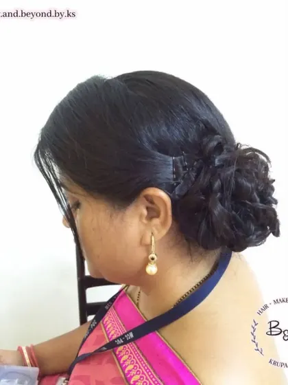 Even for a simple occasion like Teacher's Day, a nice hairstyle can make you feel special. I created this quick and easy messy bun with a side parting for a teacher who wanted to look put-together.