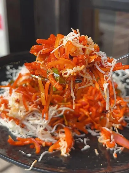 My Cheese Chinese Bhel is a delightful fusion snack. Crispy noodles are tossed in a tangy sauce and topped with a generous amount of cheese.