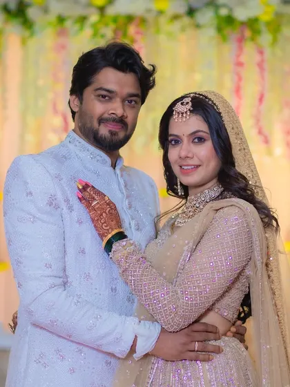 Another beautiful shot of the couple. Her makeup is flawless, enhancing her features and giving her a radiant glow.