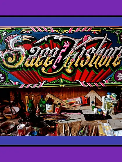 The "Saeef Kishore" sign in my workshop, surrounded by my paints and tools. This gives a glimpse into the environment where my art is born.