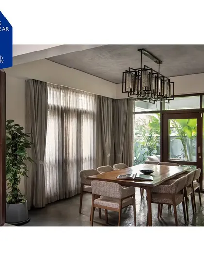 A full view of the dining space at Nairy's residence, which was nominated for the ArchDaily 2024 Building of the Year Award. The custom furniture plays a key role in the home's celebrated design.