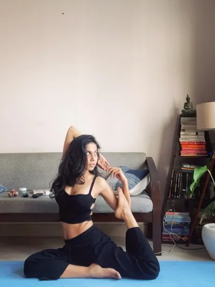 The Mermaid Pose, a beautiful variation of Pigeon Pose that adds a gentle twist and shoulder opener to the hip stretch.