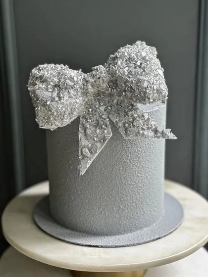 Another view of the incredible crystal sugar bow cake, showing off its texture and sparkle.