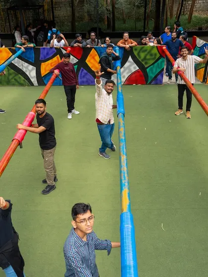 An overhead shot of our life-sized Human Foosball court. Here, you and your colleagues are the players, strapped to the poles.
