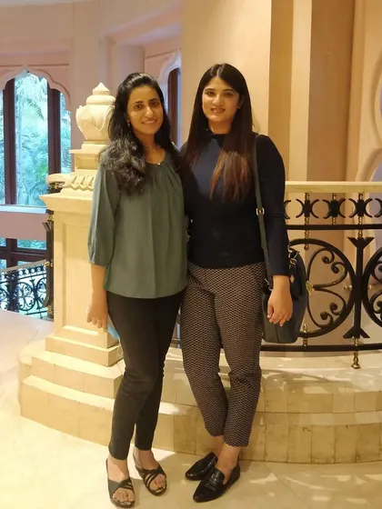 Posing with a fellow dermatologist. Events like these are a great opportunity to connect with peers who share the same passion for skin health.