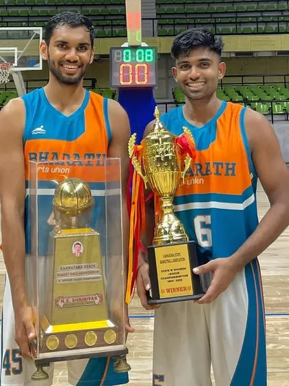 Two trophies, one team. Celebrating our successful run in the State 'B' Division league championship.