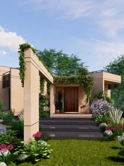 The approach to the Earth Abode, where the structure is nestled among rocks and native plants, demonstrating our commitment to landscape-sensitive design.