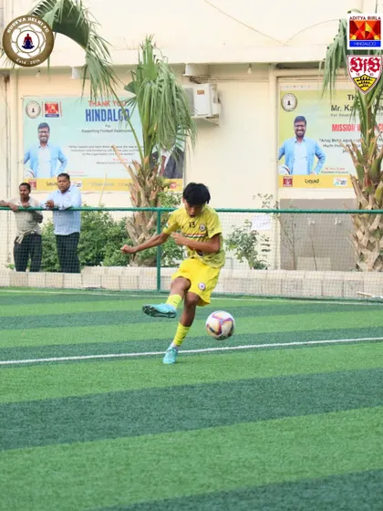 A young player executes a powerful kick during a training session with VfB Stuttgart coaches. The intensity and focus during these camps help our players elevate their technical skills significantly.
