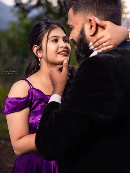 A close-up filled with love and affection. This shot highlights the beautiful connection between the couple, dressed in their elegant pre-wedding attire.