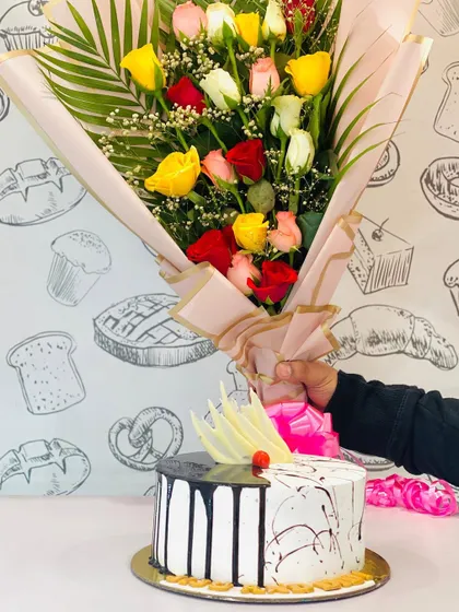 This image shows my mixed rose bouquet paired with a delicious-looking cake from a local baker. I can coordinate with other vendors to make your gift complete.