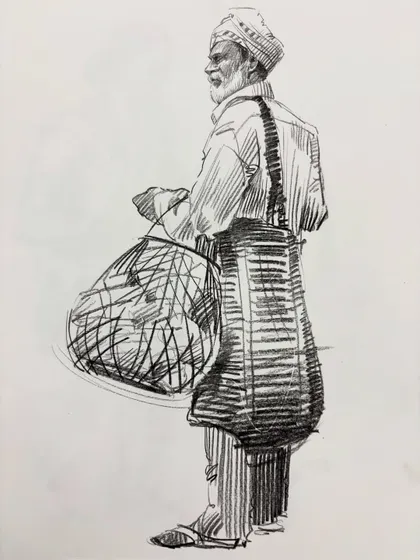 A figure sketch from the back, showing a man carrying a large basket.