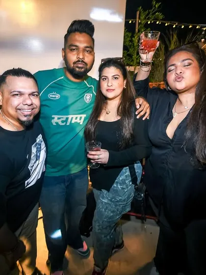 Posing with friends and fans at the Block Party. These events are about building a community around the music.