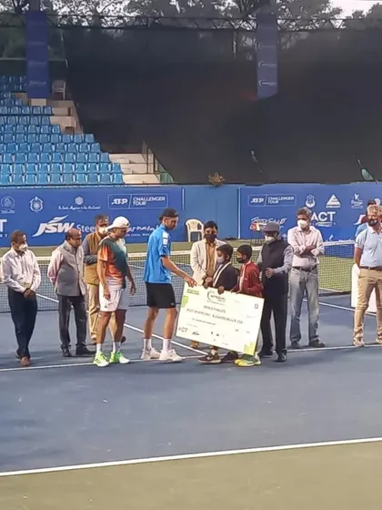 A wide shot of the prize distribution ceremony on the main court at the Bengaluru Open. Our involvement in such events showcases our capability to manage sports events at the highest level.