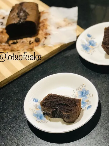 Slices of my double chocolate banana loaf served in bowls, ready for an evening snack.